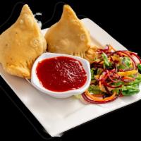 Samosa · VEGAN. A samosa is a fried or baked pastry with a savory filling, such as spiced potatoes, o...