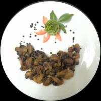 Mushroom Pepper Fry · Mushrooms are cooked with black pepper and spices. Served with masala rice