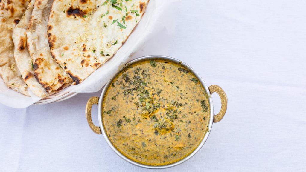 Saag Chicken · Spinach (Saag) cooked with mildly spiced creamy sauce