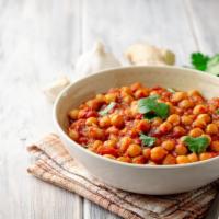 Chole Masala · Chana masala is a delicious & flavorful Indian curry made by cooking chickpeas in a spicy on...