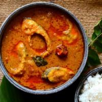 Madras Fish Curry · Boneless Fish cooked with south indian tangy and spicy sauce