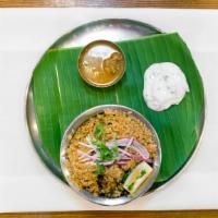 Chettinad Veggie Dum Biryani · Bunch'a vegetables, cooked together in simmer with basmati rice and spices.