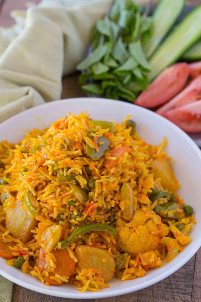 Paradise Vegetable Biryani · Mixed vegetables cooked with spices and basmati rice.