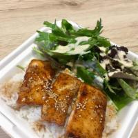 Salmon Teriyaki · Grilled Salmon with teriyaki sauce, serve over rice and a choice of side.