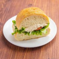 Olivieh Sandwich · Chicken salad with potatoes, pickles, hard boiled eggs, mayo and mustard.