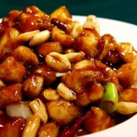 D9. Kung Pao Chicken Dinner · Served with fried rice or white rice. Spring roll or crab puff. Spicy.