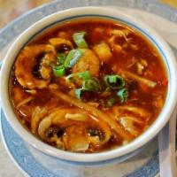 7. Hot and Sour Soup · With crunchy noodles. Spicy.