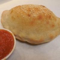 Meat Calzone · Cheese calzone with sausage, pepperoni and meatball.