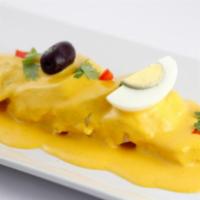 Wanka Potatoes · Papa a la Huancaina. Delightful creamy yellow pepper and cheese sauce on top of boiled potat...
