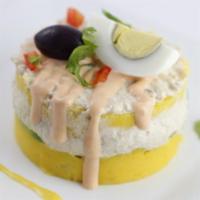 Chicken Causa · Causa de pollo. Dough of mashed potatoes seasoned with lime and yellow pepper.