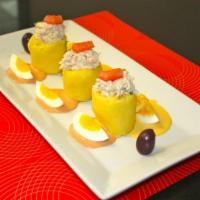 Causa Trilogy · Choose 3. Dough of mashed potatoes seasoned with lime and yellow pepper.