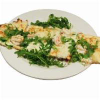 Shrimp Flatbread · Our house-made crust topped with garlic scampi, three cheeses, and fresh arugula.