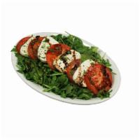 Caprese Salad · Freshly sliced buffalo mozzarella, Roma tomatoes, fresh basil, evo, balsamic reduction, salt...