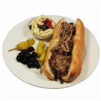 Steak & Onion Submarine · Thinly sliced ribeye steak, sautéed onions in butter and extra virgin olive oil. Choice of p...