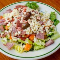 Armand's Salad · Lettuce, tomato, fontinella cheese, artichoke hearts, carrots and roasted red peppers.