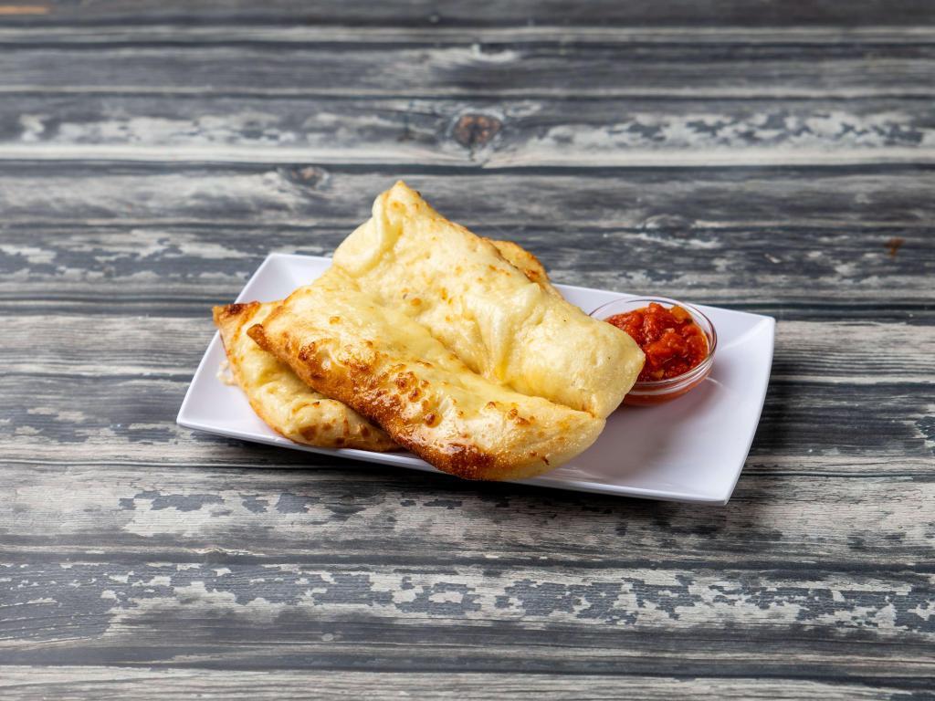 Cheese Bread · Toasted garlic bread topped with mozzarella and Parmesan cheese. Served with marinara sauce.