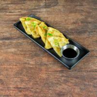 Scallion Pancakes · Oriental style thin pan-fried flat bread with minced scallions and served with sweet ginger ...