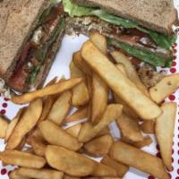 Grilled Chicken Club Sandwich · Served with mayo, lettuce, tomato and bacon.