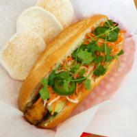 Tofu banh mi · Tofu marinaded in soy, ginger, garlic, and shallots. Topped with fresh cucumbers, mayonnaise...