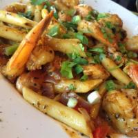 Draught's Cajun Chicken and Shrimp · Penne pasta tossed with chicken, shrimp, fresh bell peppers, red and green onions, fresh her...