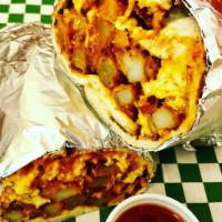 Raja's BreakFast Naan Burrito! · Bacon, Eggs, Pokora Fries, Mozzarella Cheese, Chicken Tikka Sauce and Tapatio All Wrapped Up...