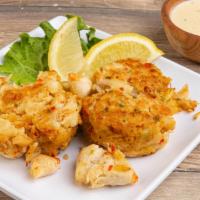 Crab Cake · Jumbo lomb crab tossed with special spices and pan steer , drisseld with home made remoulade...