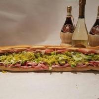 Taste of Italy Sandwich · Proscuitto ham, capocollo and provolone cheese with Italian dressing, lettuce and Italian pe...
