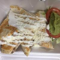 Quesadilla · A warm flour tortilla filled w/ cheese or cheese with your choice of meat