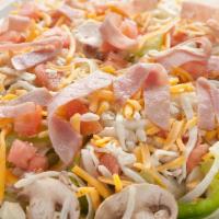 Supreme Salad · Mozzarella cheese, cheddar cheese and Canadian bacon. Includes romaine and iceberg lettuce, ...