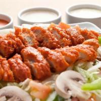 Buffalo Chicken Salad · Mozzarella cheese and crispy Buffalo chicken tenders. Come with romaine and iceberg lettuce,...