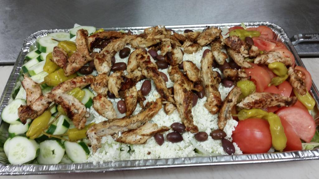 Greek with Chicken Salad · Grilled chicken, pepperoncini, olives, cucumbers, green peppers, onions, tomato, lettuce, feta cheese and pita bread.