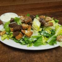 Caesar Salad · Romaine lettuce, Parmesan and croutons.
