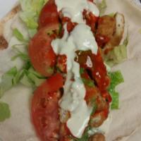 Buffalo Chicken Wrap · Fried Buffalo chicken, lettuce, tomato and blue cheese served on pita wrap. Fried chicken, B...