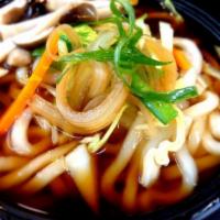 Udon Veggie Soup · Udon noodles with mixed vegetables in simmering broth. 