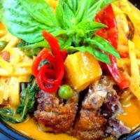 Crispy Duck Curry · Crispy duck with basil leaves, bell peppers, bamboo shoots, pineapple and sweet peas in red ...