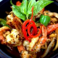 Thai Basil Leaves · Sauteed basil leaves, bamboo shoots, bell peppers, mushrooms and onions in spicy basil sauce...
