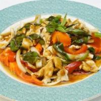 Spicy Basil Leaf · A tasty stir-fried chili sauce with your choice of meat, onions, carrots, bell peppers, and ...