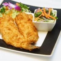 Trout Delight · Battered boneless trout deep fried and served with green apple salad.