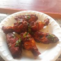 6 Piece Chicken Wings Amar Style · Chicken party wings marinated in special tondoori sauce, grilled in clay tondoori oven, topp...