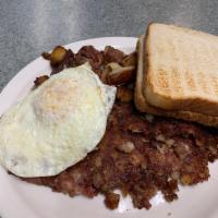 Hash Special · 2 eggs, grilled corned beef hash, home fries and toast.