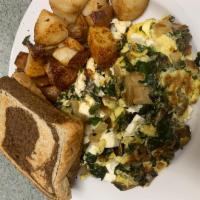 Granite Street Scrambler · Scrambled eggs with spinach, mushrooms, onions and feta. Served with home fries and toast.
