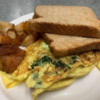 Veggie Omelette · Spinach, onions, green peppers, broccoli, mushrooms, tomatoes and cheese. Vegetarian. 3 eggs...
