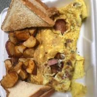 Meat Lovers Omelette · Ham, bacon, sausage, linguica and cheese. 3 eggs served with home fries and toast.