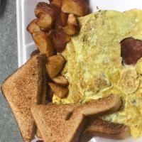 Kielbasa Omelette · 3 eggs, cheese, onions, peppers, kielbasa, and cheese. Served with home fries and toast.