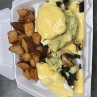 Spinach and Mushroom Benedict · 2 poached eggs, spinach, and mushroom on an english muffin. Served with home fries and cream...