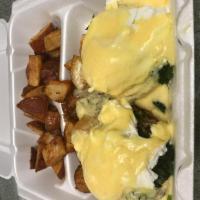 Mirella Benedict · 2 poached eggs, Canadian bacon and spinach on an English muffin. Served with home fries and ...
