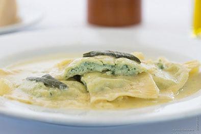 Ravioli Al Formaggio · Homemade ravioli stuffed with spinach, ricotta cheese served in your choice of sauce.