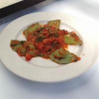 Ravioli Di Aurora · Homemade ravioli stuffed with meat and ricotta cheese served in your choice of sauce.