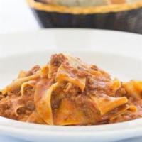 Pappardelle Bolognese · Homemade wide fettuccine with meat sauce ragout bolognese.