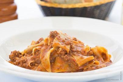 Pappardelle Bolognese · Homemade wide fettuccine with meat sauce ragout bolognese.